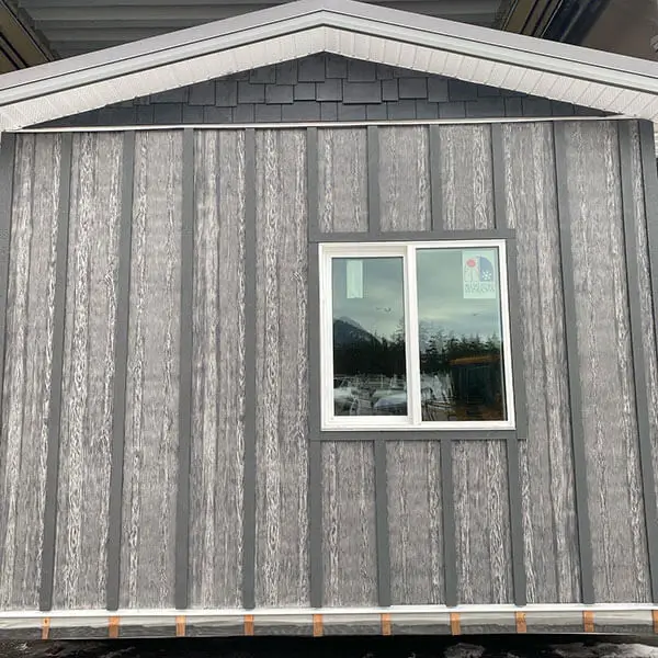 Shuswap Structures grey-sided house ready for delivery