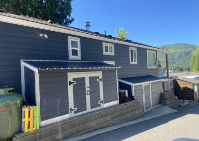 Shuswap Structures dark blue sided cottage