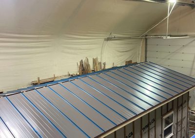 Shuswap Structures prefab house metal roof installed