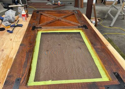 Shuswap Structures finishing a door